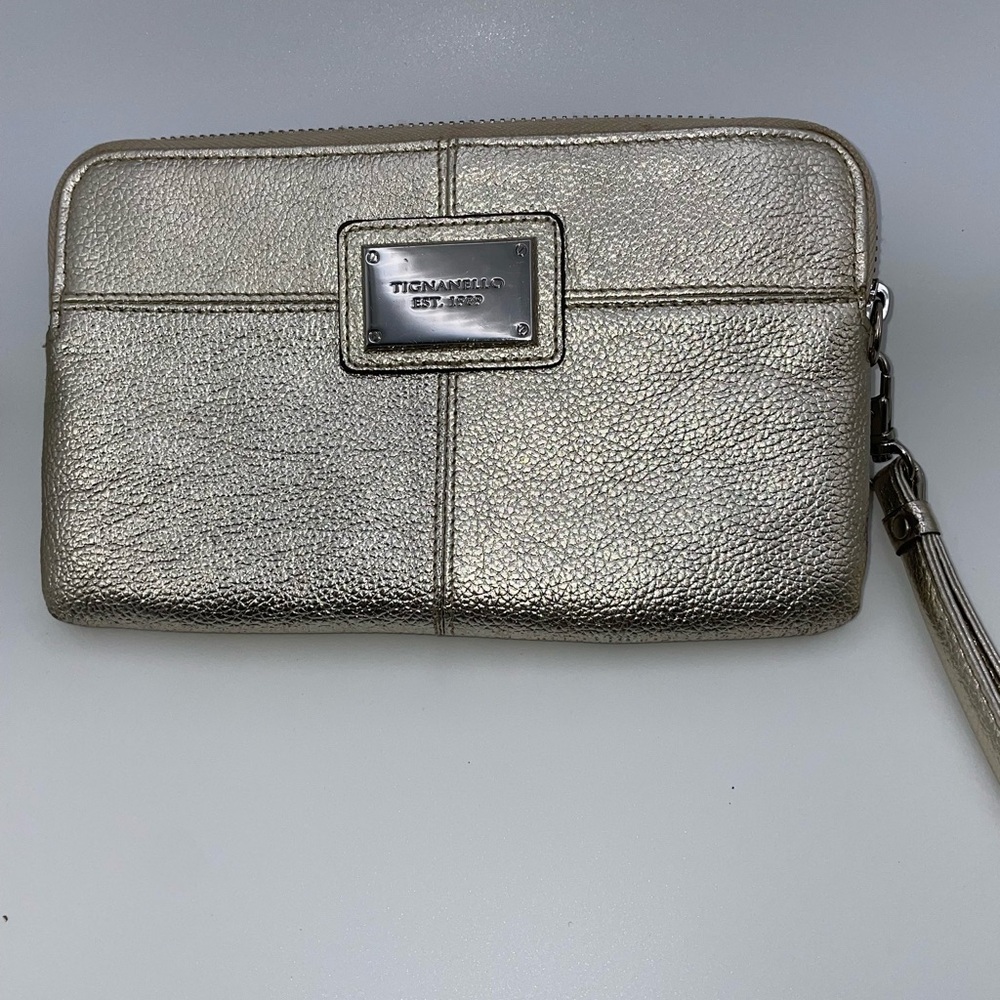 TIGNANELLO Gold Wallet/Wristlet with strap. Gently used condition.